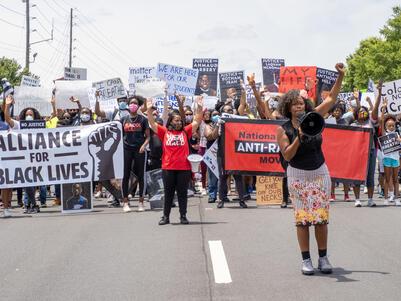 Tarece Johnson leading a Justice for Black Lives march she organized in Atlanta, June 7, 2020