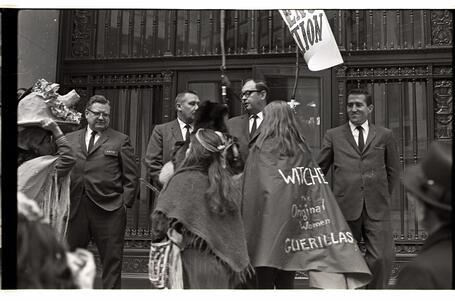 WITCH hexing Wall Street, bankers looking on, October 31, 1968, New York.