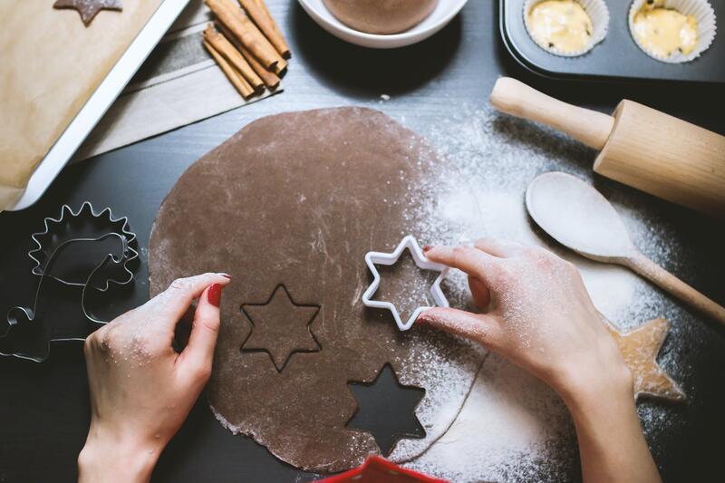 Person Holding Star of David Baking Mold
