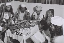 Yemenite family celebrating Passover, Tel Aviv, 1946, by Zoltan Kluger.