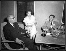 Left to right: French Ambassador to Israel Edouard Guyon, Esther Herlitz, and Israeli Foreign Minister Moshe Sharett at Hakirya seated around a table