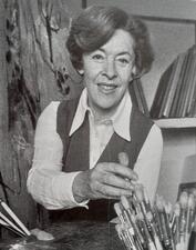 Judy Cassab reaching for a paintbrush