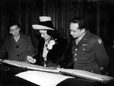 Denise and Stanley Shorr Signing Their Marriage Registry, 1944