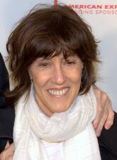 Nora Ephron at the 2010 Tribeca Film Festival smiling wearing a white scarf
