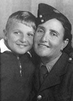 Sionah Tagger, wearing a uniform, with a child