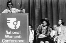 Congresswoman Barbara Jordan Speaking at the National Women's Conference with Bella Abzug and Rosalynn Carter, 1977