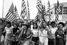 Marchers with the Olympic Torch at the National Women's Conference, 1977, by Diana Mara Henry