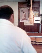 "Hanging carcass in butcher shop, ca. 1969," by Diana Mara Henry