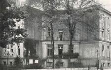 black and white historical photograph of large building