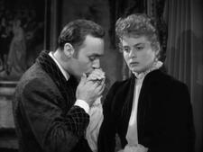 Gaslight movie still - Charles Boyer kissing Ingrid Bergman's hand