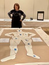 Sheila Miller with mock-up of "Making Your Mark" art piece