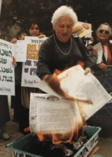 Alice Shalvi Burning Ketubot: a woman lights Jewish marriage documents on fire
