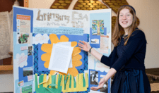 2016-2017 Rising Voices Fellow Molly Pifko with her Bat Mitzvah Project Display