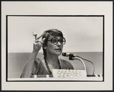 Barbara Seaman holding vaginal cap at Pre-1980 Women's March press conference
