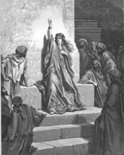 Deborah stands before a group, praising Jael. 