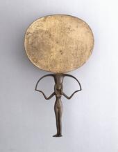  Mirror made of silver and copper alloy. Nude female figure-handle with vivid dark green patina with some brown areas. 