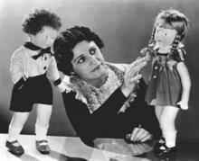 Beatrice Alexander Examining Dolls, circa 1920s