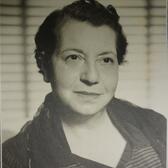 Half-portrait of Helene Cazes Benatar smiling