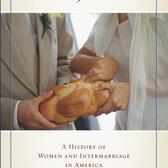 a book cover, featuring a picture of a man and woman tearing a loaf of challah