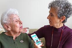 Elderly woman being interviewed with Story Aperture app