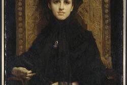 Portrait of Geneviève Straus, She is clothed in black and sits in a high-back wooden chair. She stares directly in front of her. Her left hand rests in her lap while her right lays on the chair's arm rest.