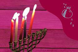 Photograph of Hanukkah candles outdoors collaged on a dark pink background
