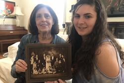 Elizabeth Danon holding family photo
