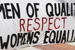 Banner that reads, "men of quality respect women's equality