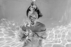 woman screaming underwater