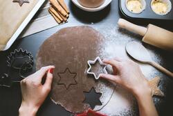Person Holding Star of David Baking Mold