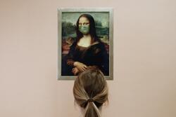Woman Looking at Painting of Mona Lisa with Face Mask.