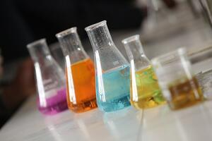 Chemistry beakers with colorful liquid