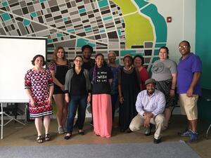 Photograph of JWA Program Manager Larisa Klebe with members of Jews in ALL Hues who participated in a Story Aperture workshop