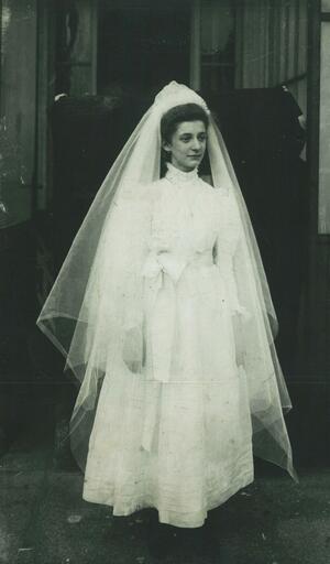 Tilde Vita wearing a white dress and veil
