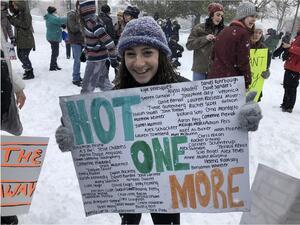 2018-2019 Rising Voices Fellow Phoebe Chapnick-Sorokin at a 2018 March for Our Lives action that she planned. 