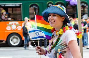 Participant with Flags at the Boston Pride Parade 