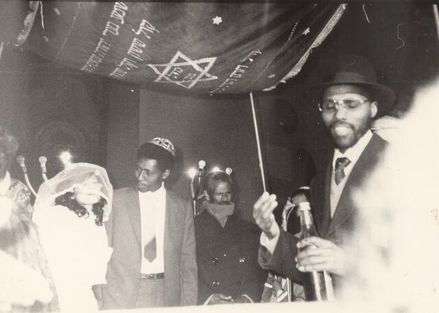 Jewish wedding ceremony under the chuppah (canopy).