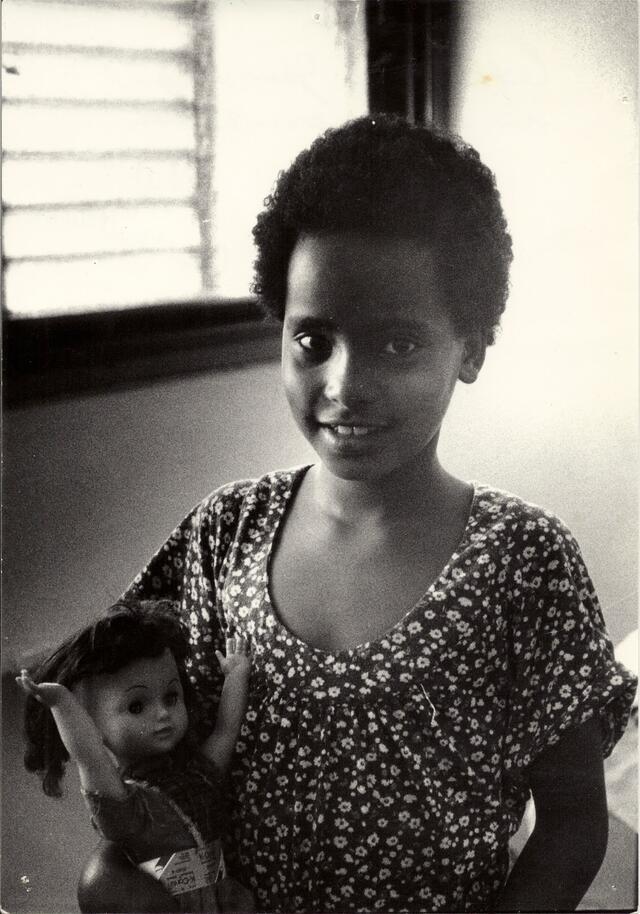 Ethiopian Jewish girl holding doll. Around 1980.