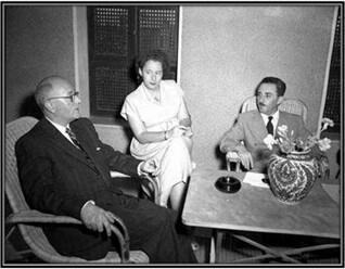 Left to right: French Ambassador to Israel Edouard Guyon, Esther Herlitz, and Israeli Foreign Minister Moshe Sharett at Hakirya seated around a table