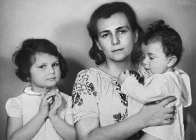 Ewa Kuryluk as a child with her mother, holding her younger brother