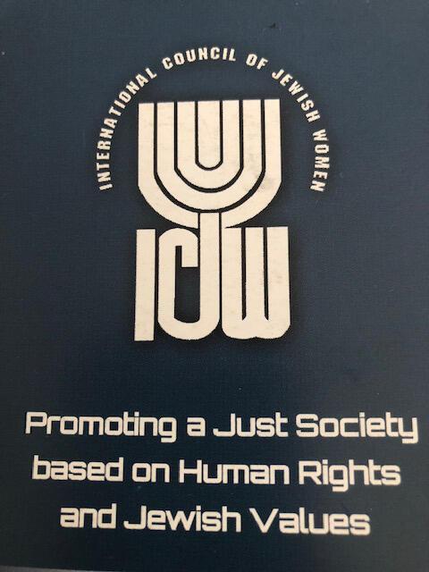 The ICJW logo, with the J forming the center branch of a menorah, and the motto beneath it