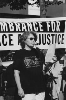 Writer and editor Melanie Kaye Kantrowitz speaking at a rally held by the organization Women in Black