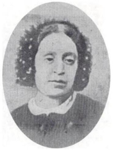Upper body portrait of Rachel Morpurgo, with her hair pulled up in a beaded net