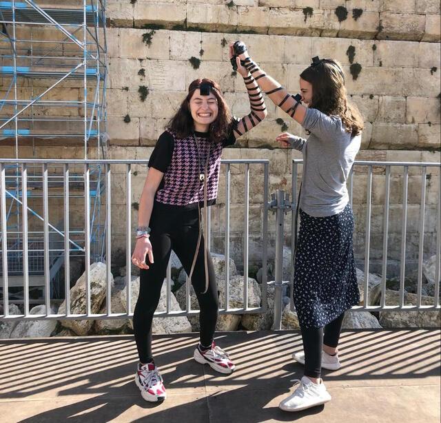 Maya Stutman-Shaw Wearing Tefillin with a Friend at the Western Wall