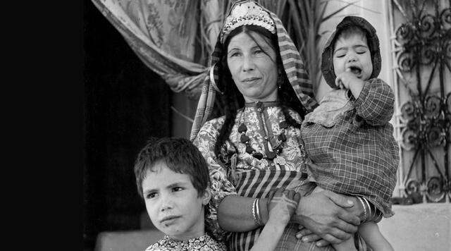 Jewish woman and children outside a synagogue in Djerba, Tunisia, 1950.
