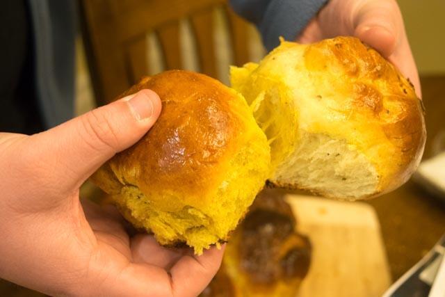 Sweet and Savory Pull-Apart Challah, being pulled apart