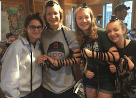 Camp Ramah campers trying Tefillin, 2016